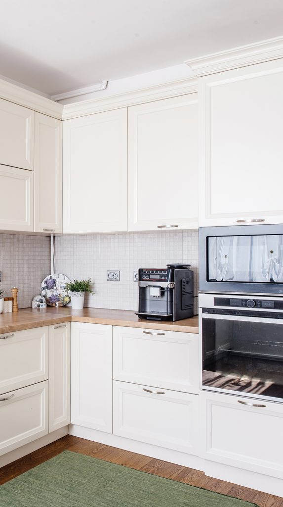 kitchen area in new home. Modern design and white furniture