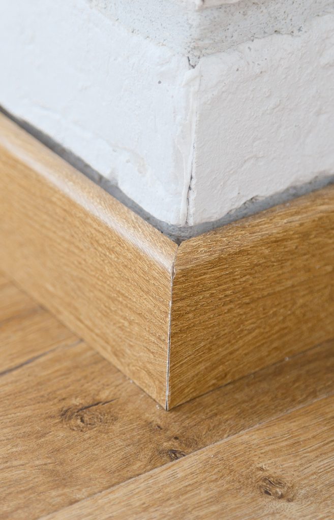 Wooden floor plinth. Interior details. Loft style